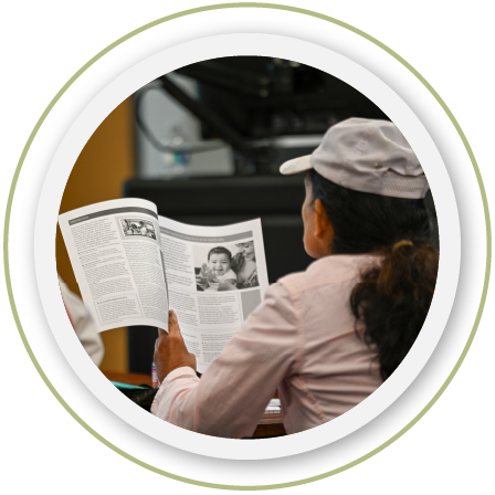 A provider reading a brochure at a coaching session.