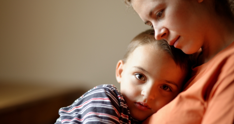 Parent holding child