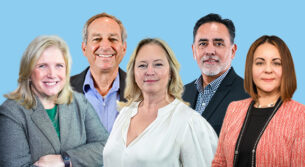 Five team members of OST standing professionally in a group phot.