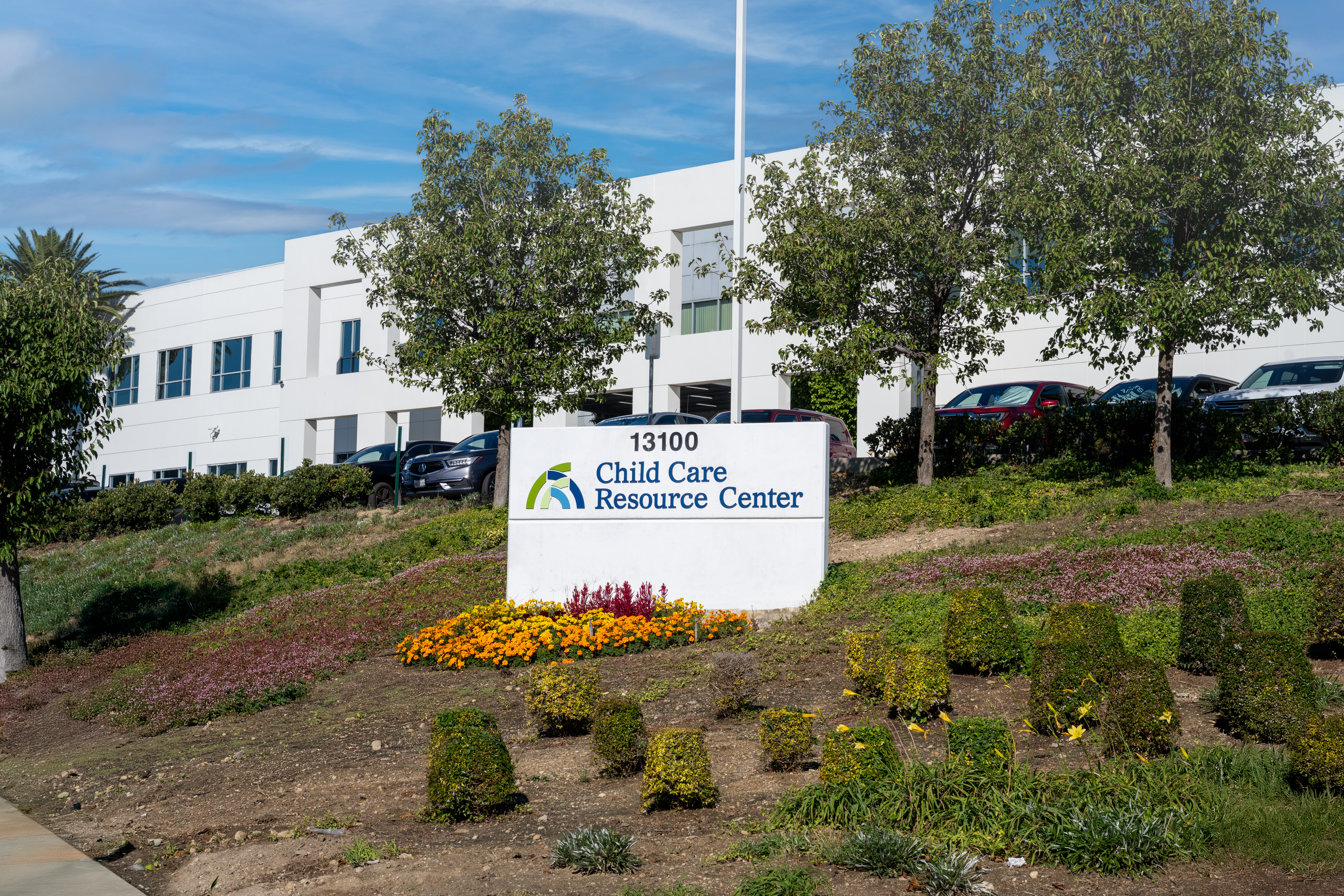An image of CCRC's Sylmar office. Featuring our main sign up front and the buildling in the backgound.